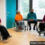 Home 19 회복적 정의 실천을 위한 정책 방향 - A diverse group of community members gathered in a bright, welcoming room arranged in a circle for a...